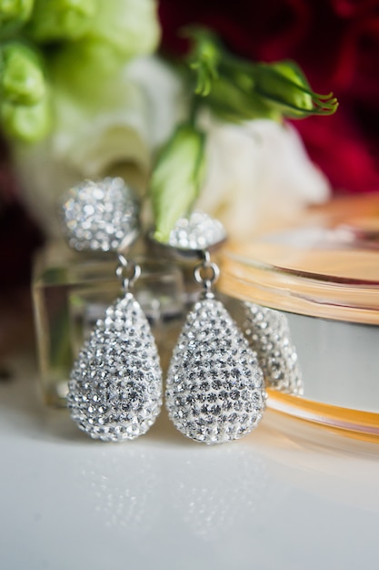 Close up of diamond earrings. close up,  space for your text