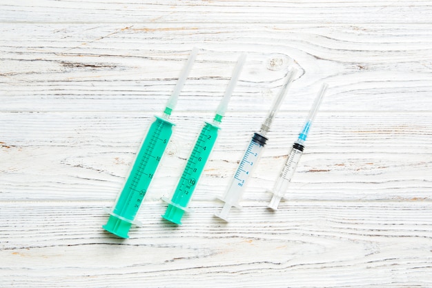 Close-up of different types of syringes