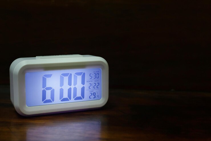 फोटो close-up of digital clock on table