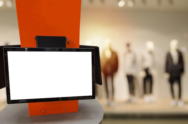 Close-up of digital tablet in shopping mall