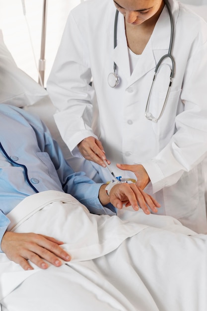 Close up doctor doing injection