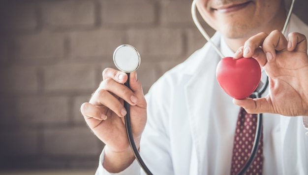 Close up of doctor hands with heart