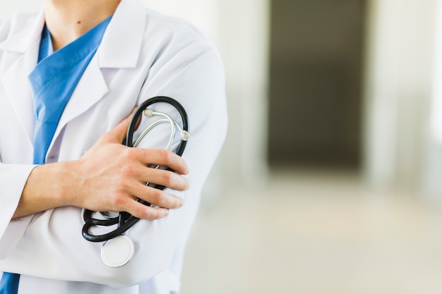 Photo close up of doctor with stethoscope