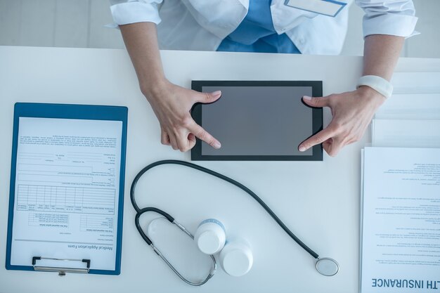 Close up of a doctor working in the office