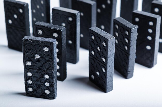 Close-up of dominoes over white background