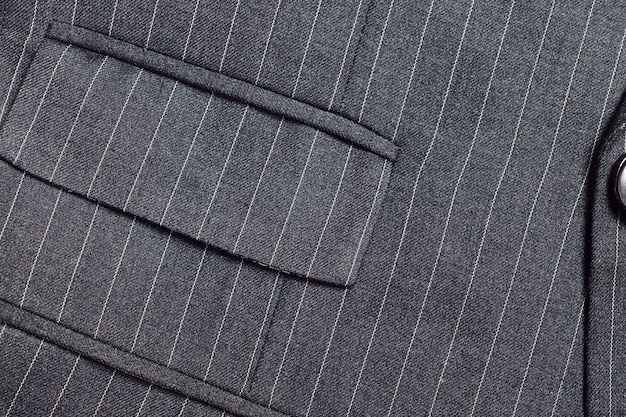 Photo close up of double pocket on pinstripe suit