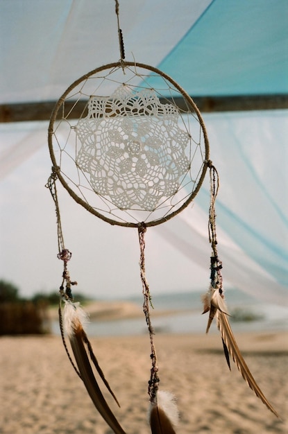 Photo close-up of dreamcatcher at beach