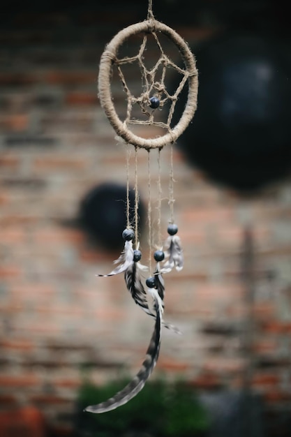 Photo close-up of dreamcatcher hanging