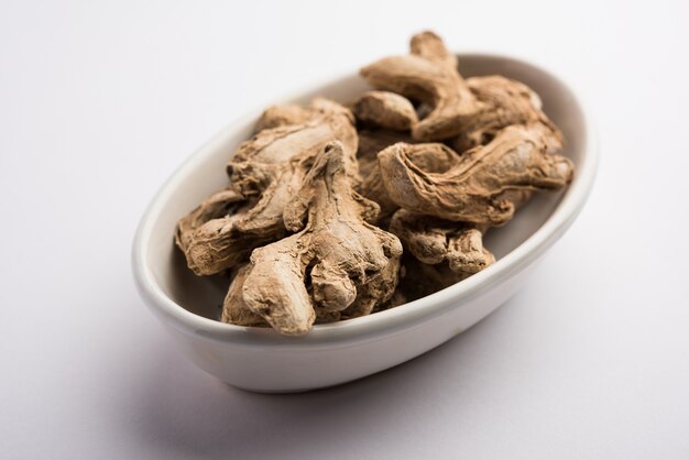 Close up of Dried ginger or Sonth isolated on white surface