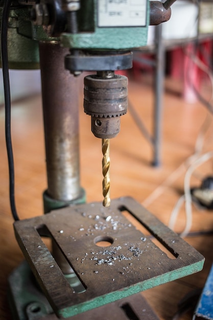 Photo close-up of drill in workshop