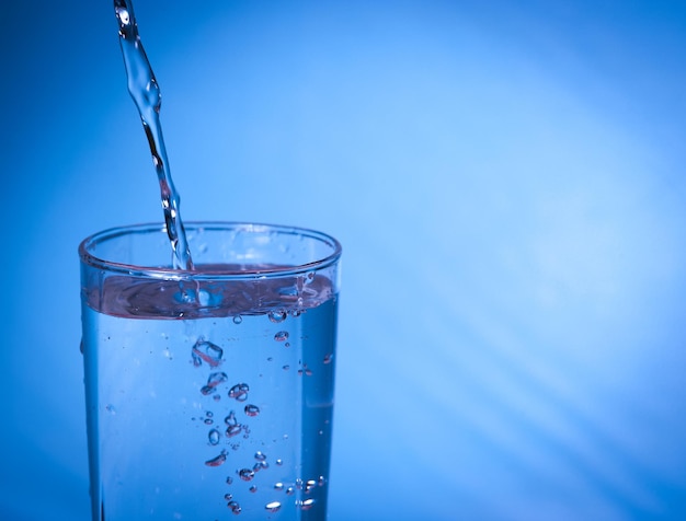 Close-up of drink against blue background