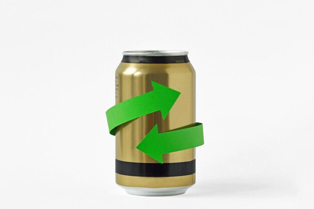 Photo close-up of drink can against white background