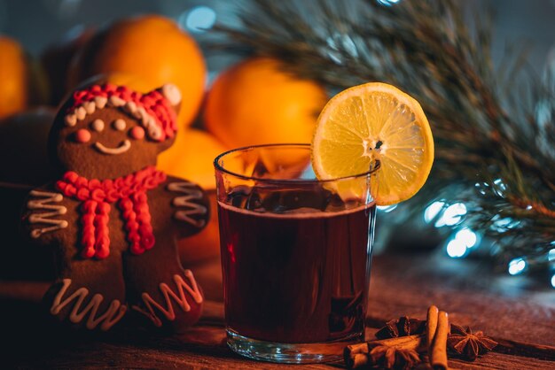 Close-up of drink and gingerbread cookie on table