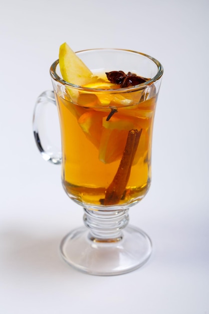 Close-up of drink in glass against white background