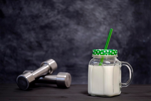 Close-up of drink in glass jar on table