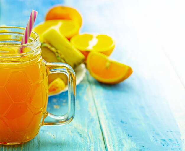 Close-up of drink in glass jar on table