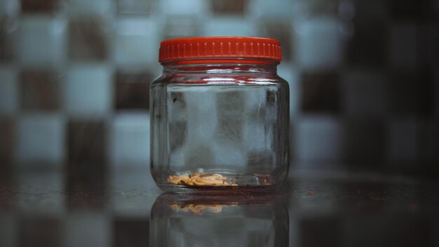 Photo close-up of drink in glass jar on table