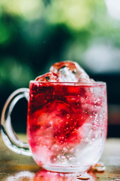 Close-up of drink on glass table