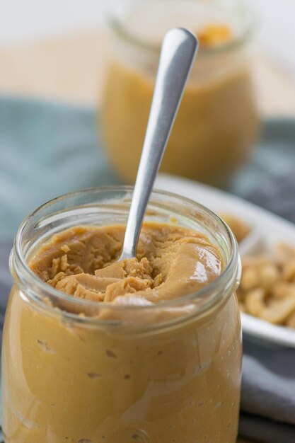 Photo close-up of drink in jar on table