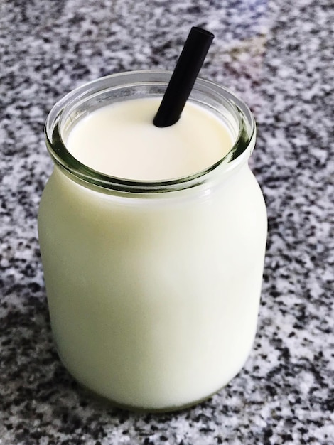 Close-up of drink in jar on table