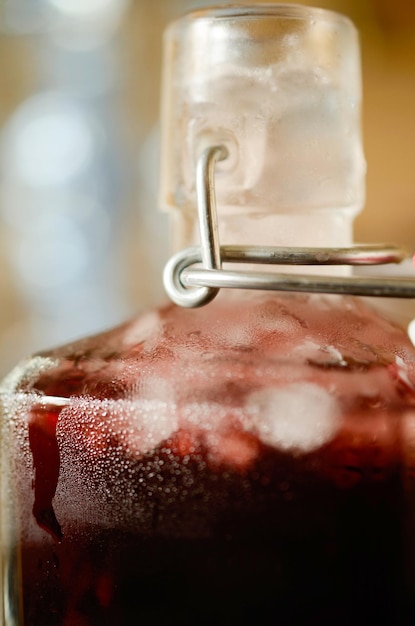 Photo close-up of drink in jar on table