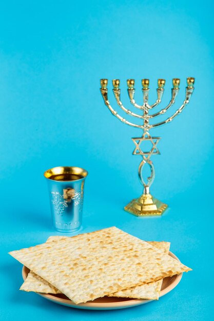 Close-up of drink served on table against blue background