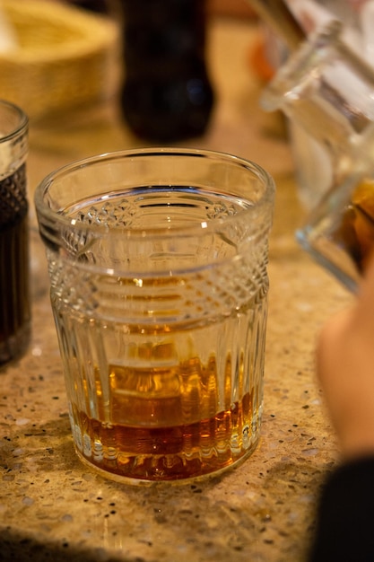 Photo close-up of drinking glass on table