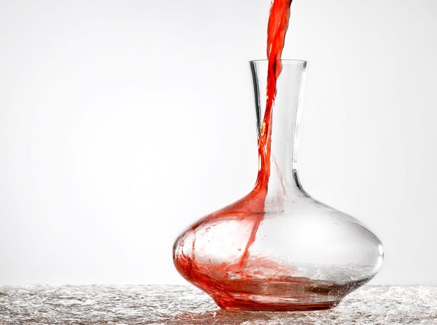 Photo close-up of drinking water against white background