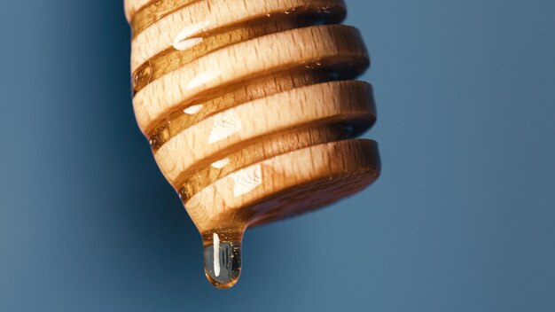 Close up of Dripping Spoon Of Honey