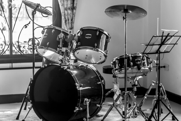 Photo close-up of drum kit indoors