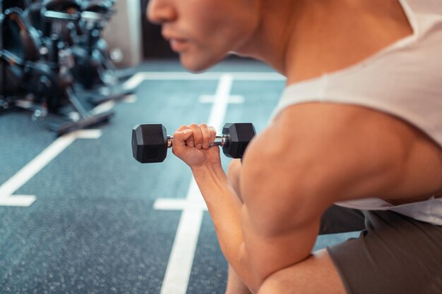 Close up of a dumbbell being lifted