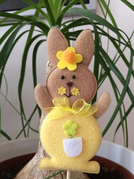 Close-up of easter bunny on potted plant