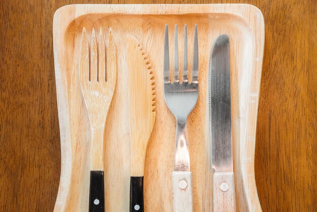 Close-up of eating utensils in tray