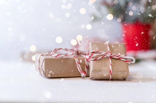 Close up on eco Christmas gifts with bokeh lights