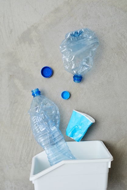 Close-up of eco trash bin with sorted plastic bottles in it