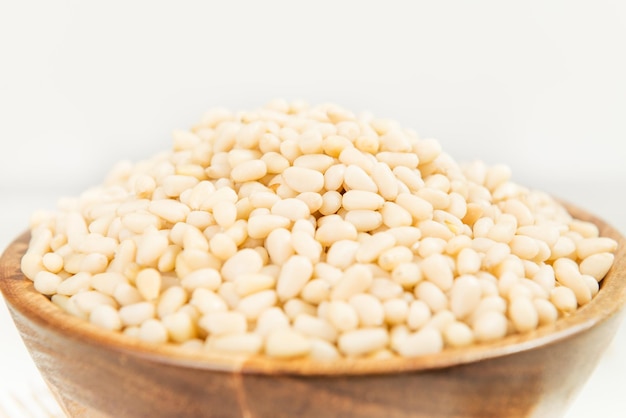 Close-up of eggs in bowl against white background