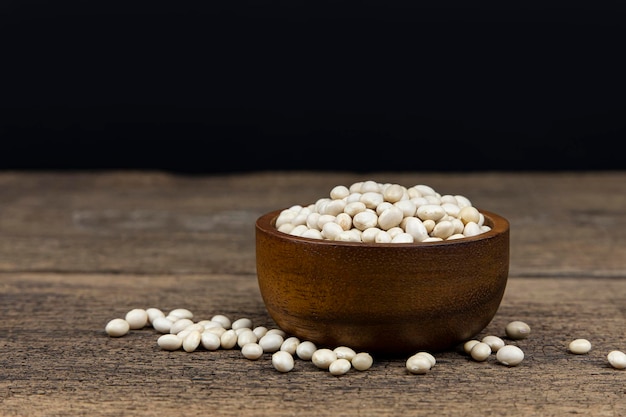 Photo close-up of eggs on table against black background