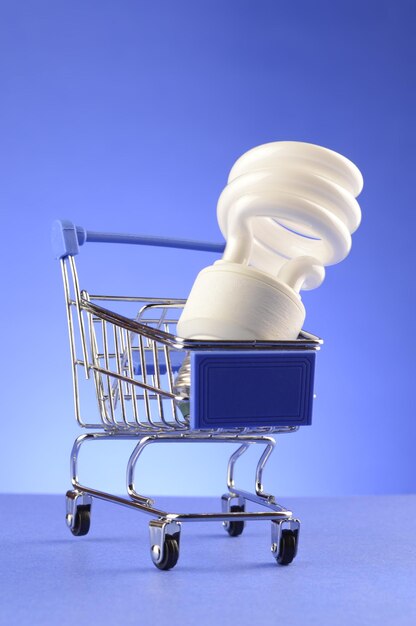 Close-up of electric lamp against blue background