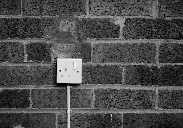 Photo close-up of electric socket on wall