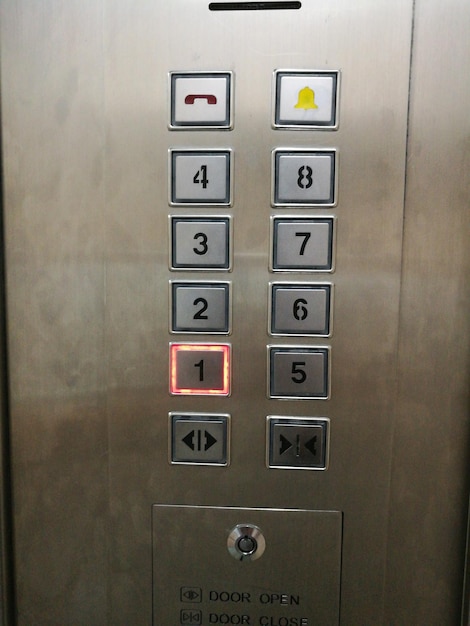 Photo close-up of elevator push buttons