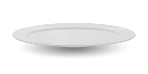 Photo close-up of empty plate against white background