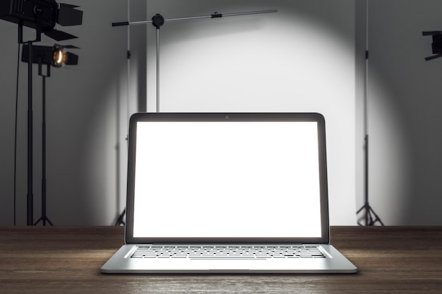 Close up of empty white laptop in photo studio Mock up 3D Rendering