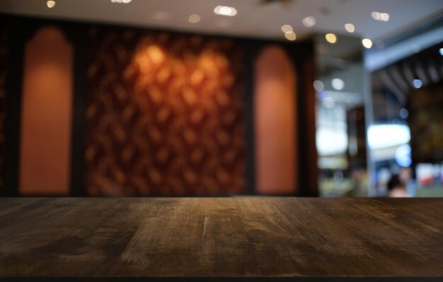 Close-up of empty wooden table in restaurant