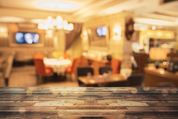 Photo close up of empty wooden table surface or counter with blurry cafe in the backdrop copy space 3d rendering