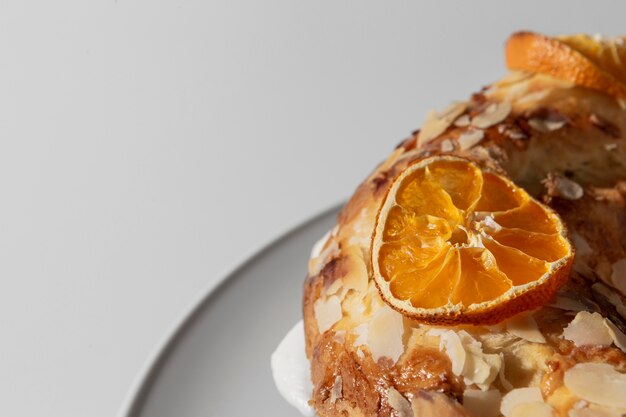 Photo close-up of epiphany day dessert with copy space and dried citrus