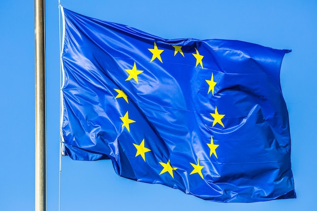 close-up of european flag against blue sky
