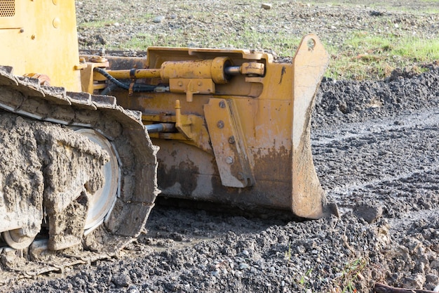 Photo close-up of excavator at construction site