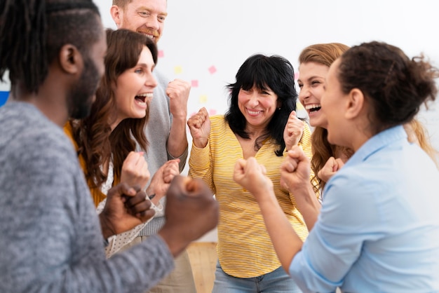 Close up excited people celebrating