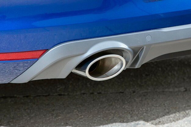 Close-up an exhaust pipe of a car.