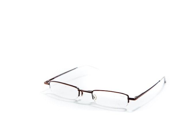 Close-up of eyeglasses against white background